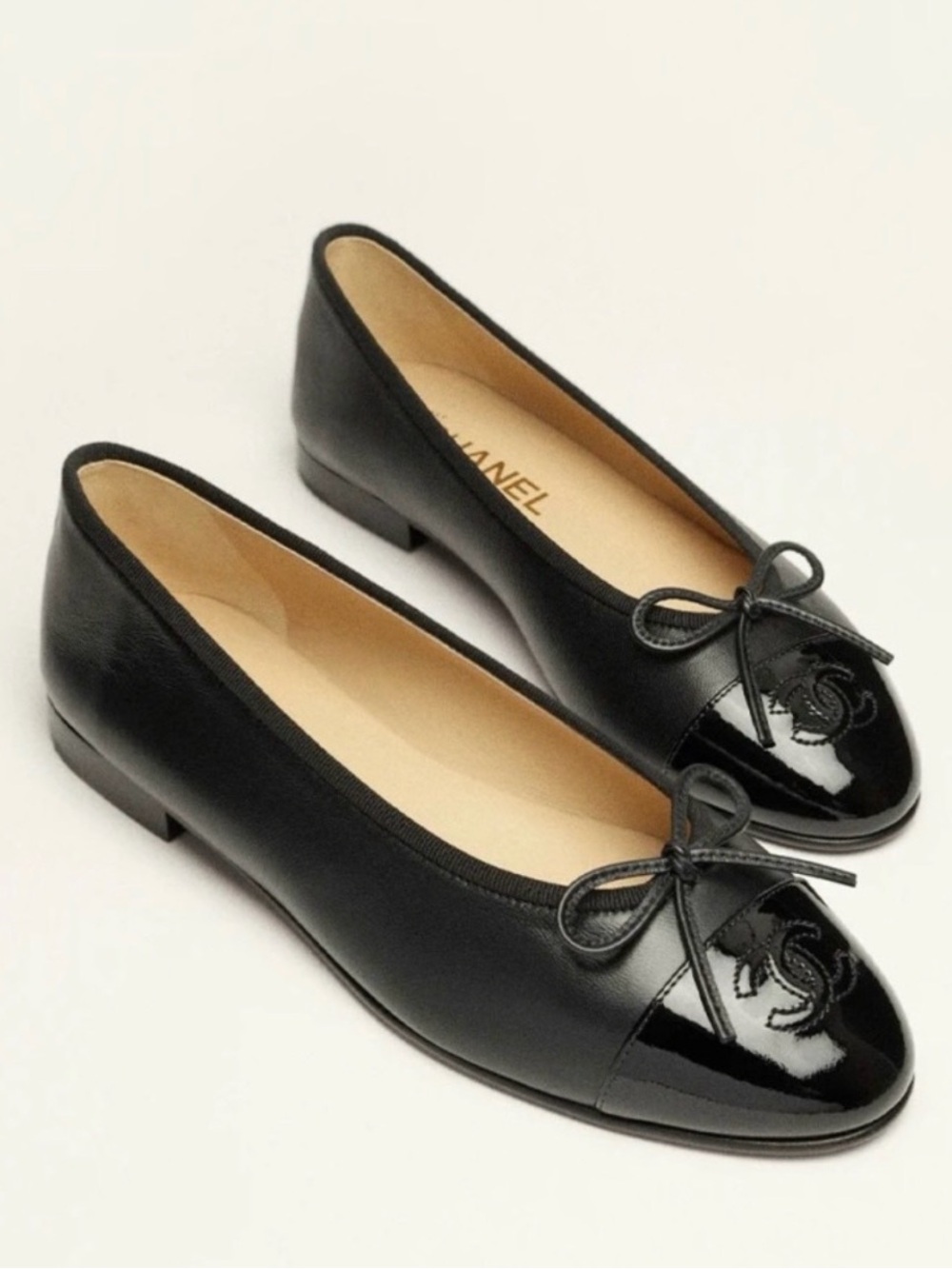 CHANEL Black Leather Cap-Toe Ballet Flats with Bow